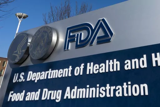 A sign for the U.S. Food and Drug Administration is displayed outside their offices in Silver Spring, Md., Dec. 10, 2020. U.S. health regulators are warning consumers not to use more than two dozen varieties of over-the-counter eyedrops because of the risk of infections that could lead to blindness. (AP Photo/Manuel Balce Ceneta, File)
