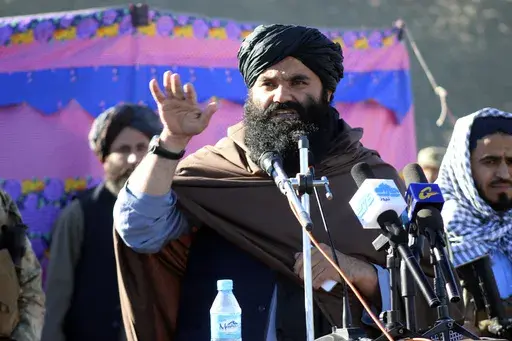 Acting interior minister Sirajuddin Haqqani, speaks during the funeral prayers of Khalil Haqqani, the minister for refugees and repatriation, during his funeral procession in eastern Paktia province, Afghanistan, Dec. 12, 2024. (AP Photo/Saifullah Zahir, File)