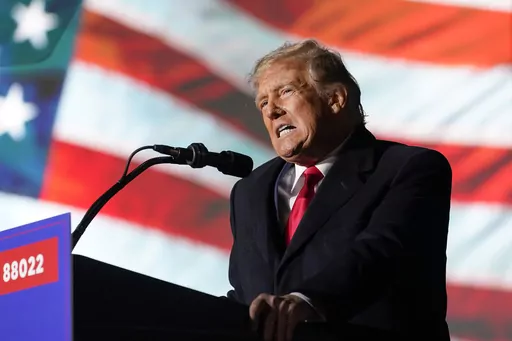 Former President Donald Trump speaks at a campaign rally in support of the campaign of Ohio Senate candidate JD Vance at Wright Bros. Aero Inc. at Dayton International Airport, Nov. 7, 2022, in Vandalia, Ohio. On Friday, March 24, 2023 The Associated Press reported on stories circulating online incorrectly claiming it is a double standard that Trump may be indicted over alleged hush money payments to women who accused him of sexual encounters, while former President Bill Clinton faced no crimina