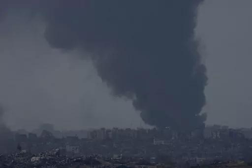 Smoke rises following an Israeli bombardment in the Gaza Strip, as seen from southern Israel,, Friday, Dec. 8, 2023. (AP Photo/Maya Alleruzzo)