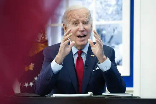 President Joe Biden speaks as he meets with the White House COVID-19 Response Team on the latest developments related to the Omicron variant in the South Court Auditorium in the Eisenhower Executive Office Building on the White House Campus in Washington, Tuesday, Jan. 4, 2022. (AP Photo/Andrew Harnik)
