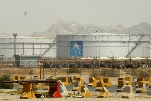 Storage tanks are seen at the North Jeddah bulk plant, an Aramco oil facility, in Jeddah, Saudi Arabia, on March 21, 2021. Saudi Arabia said Friday, May 31, 2024, it will sell a second sliver of stock in its state oil giant Aramco worth billions of dollars, its first tranche since its initial public offering back in 2019. (AP Photo/Amr Nabil, File)