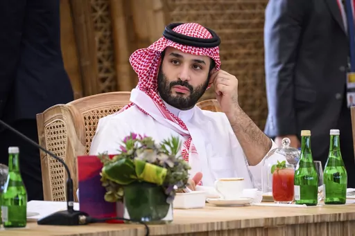 Crown Prince Mohammed bin Salman of Saudi Arabia takes his seat ahead of a working lunch at the G20 Summit, Tuesday, Nov. 15, 2022, in Nusa Dua, Bali, Indonesia. In the years since Saudi Crown Prince Mohammed bin Salman catapulted to power, it has been hard to find a controversy in the Middle East that doesn't somehow involve the 37-year-old heir to the throne. Now he's pivoting to his next audacious plan: Giving peace a chance. (Leon Neal/Pool Photo via AP, File)