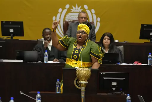 Pemmy Majodina, chief whip of the ruling African National Congress, addresses members of parliament in Cape Town, South Africa, Tuesday, Nov. 21, 2023. The majority of MP's voted to close the Israeli embassy in South Africa over the war in Gaza. (AP Photo/Nardus Engelbrecht)