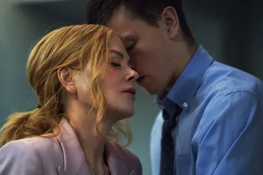 This image released by A24 shows Nicole Kidman, left, and Harris Dickinson in a scene from "Babygirl." (Niko Tavernise/A24 via AP)