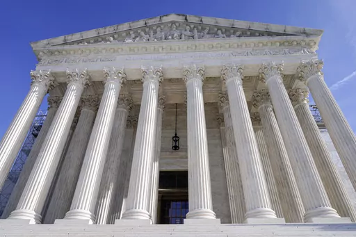 The U.S Supreme Court is photographed, Jan. 3, 2024, in Washington. The Supreme Court on Tuesday left in place the admissions policy at an elite public high school in Virginia, despite claims that it discriminates against highly qualified Asian Americans. (AP Photo/Mariam Zuhaib, file)