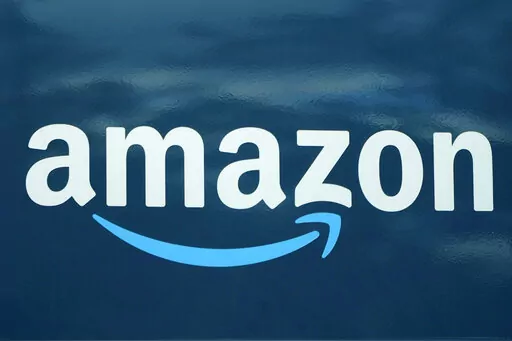 An Amazon logo appears on an Amazon delivery van on Oct. 1, 2020, in Boston. Amazon will give its U.S. Prime members free access to meal delivery service Grubhub for a year under a deal announced Wednesday, July 6, 2022. (AP Photo/Steven Senne, File)