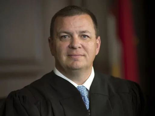 This photo provided by the North Carolina Administrative Office of the Courts shows Associate Justice Phil Berger Jr. In massive victories for Republicans, the newly GOP-controlled North Carolina Supreme Court on Friday, April 28, 2023, threw out a previous ruling against gerrymandered voting maps and upheld a photo voter identification law that colleagues had struck down as racially biased. (North Carolina Administrative Office of the Courts via AP, File)