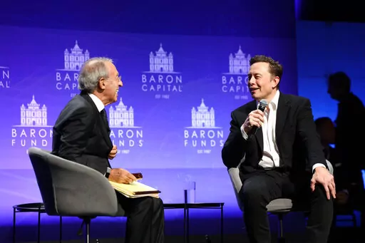 Baron Capital Group Chairman and CEO Ron Baron interviews Tesla CEO Elon Musk at the 29th Annual Baron Investment Conference in New York City on Friday, Nov. 4, 2022. ( Baron Capital via AP)