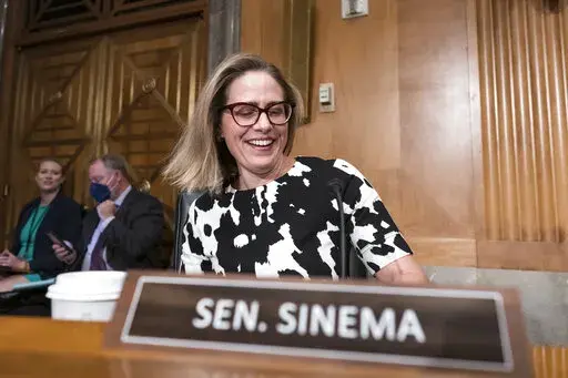 Sen. Kyrsten Sinema, D-Ariz., arrives for a meeting of the Senate Homeland Security Committee at the Capitol in Washington, Wednesday, Aug. 3, 2022. Sen. Joe Manchin sealed the deal reviving President Joe Biden’s big economic, health care and climate bill. But it was Sinema who intently, quietly and deliberately shaped the final product. (AP Photo/J. Scott Applewhite, File)