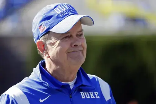 Duke head coach David Cutcliffe watches the team before an NCAA college football game against Miami Saturday, Nov. 27, 2021, in Durham, N.C. Former Mississippi and Duke coach David Cutcliffe has joined the Southeastern Conference as special assistant to the commissioner for football relations. The league announced the hiring on Thursday, March 24, 2022. (AP Photo/Chris Seward, File)