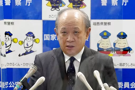 National Police Agency Chief Itaru Nakamura speaks during a press conference at the National Police Agency in Tokyo Thursday. Aug. 25, 2022. Nakamura said he will resign to take responsibility over the fatal shooting of former Japanese Prime Minister Shinzo Abe at a campaign speech last month. (Kyodo News via AP)