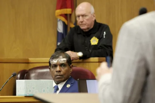 Brookhaven Police Department detective Vincent Fernando, center, testifies Wednesday, Aug. 16, 2023, in Brookhaven, Miss., at the trial of two white men who are accused of chasing and shooting at a Black FedEx driver who had dropped off a package at a home. (Hunter Cloud/The Daily Leader via AP)
