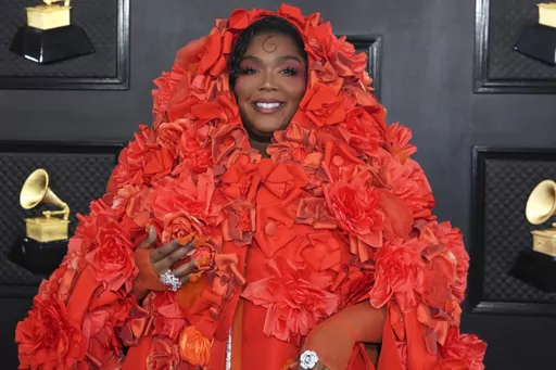Lizzo arrives at the 65th annual Grammy Awards on Feb. 5, 2023, in Los Angeles. In a concert Friday, April 21, 2023 in Knoxville, Tenn., Lizzo filled the stage with drag queens in a glittery protest against the state's legislation designed to restrict drag performances in public. (Photo by Jordan Strauss/Invision/AP)
