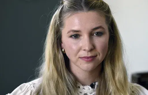 Erika Mahoney, whose father, Kevin Mahoney, was killed in a 2021 supermarket attack in Boulder, Colo., is interviewed in Boulder County, Colo., Wednesday, Sept. 25, 2024. (AP Photo/Thomas Peipert)