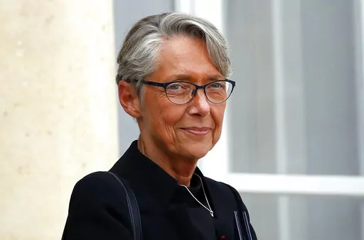 French Junior Minister for Ecology and Solidarity Elisabeth Borne leaves the Elysee Palace after the weekly cabinet meeting, in Paris, Wednesday, Sept. 5, 2018. France's president Emmanuel Macron appoints Elisabeth Borne as the country's new prime minister, Monday May 16, 2022. (AP Photo/Christophe Ena, File)