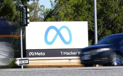 Facebook unveiled their new Meta sign at the company headquarters in Menlo Park, Calif., on Oct. 28, 2021. Shares of the company formerly known as Facebook saw a historic plunge Thursday after the social media giant reported a rare profit decline due to a sharp rise in expenses, shaky ad revenue growth and fewer daily U.S. users on its flagship platform. (AP Photo/Tony Avelar, File)