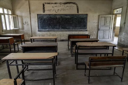 A classroom of a Hazara Shiite school sits empty in Kabul, Afghanistan, Sunday, July 31, 2022. The United Nations on Sunday, Sept. 18, 2022, called for Afghanistan's Taliban rulers to reopen schools to girls in grades 7-12, calling the anniversary of their exclusion from high school “shameful.” (AP Photo/Ebrahim Noroozi, File)