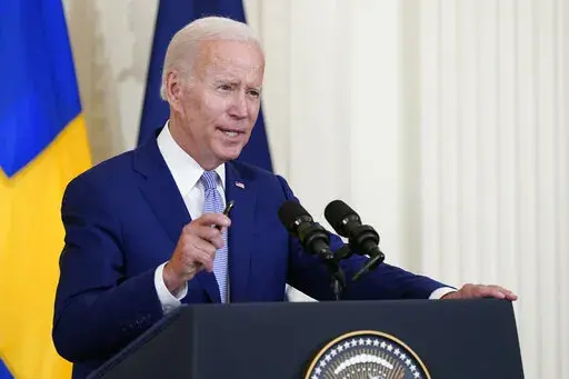 President Joe Biden speaks in the East Room of the White House in Washington, Tuesday, Aug. 9, 2022. Climate activists are clamoring for President Joe Biden to declare a national climate emergency, calls the White House has so far not headed. (AP Photo/Susan Walsh, File)