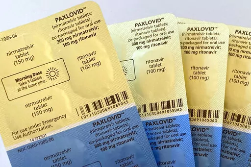 Doses of the anti-viral drug Paxlovid are displayed in New York, on Monday, Aug. 1, 2022. Pfizer's COVID-19 pill may provide little benefit for younger adults, while still reducing the risk of hospitalization and death for higher-risk seniors, according to an Israeli study published Wednesday, Aug 24, 2022. (AP Photo/Stephanie Nano)