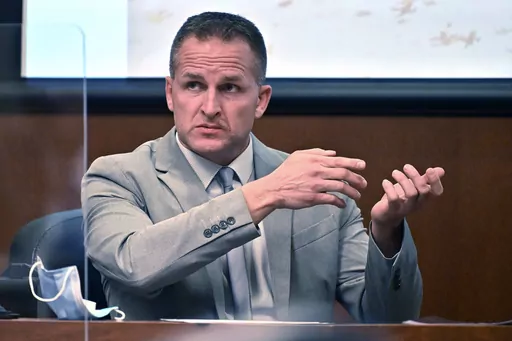 Former Louisville Police officer Brett Hankison talks about seeing a subject in a firing stance in the apartment as he is cross-examined in Louisville, Ky. on March 2, 2022. The former Louisville police officer who fired into Breonna Taylor’s apartment the night she was killed is going on trial in federal court this week. Hankison is charged with violating Taylor’s civil rights during the botched 2020 raid. The trial will mark a second attempt by prosecutors to convict Hankison for his actio