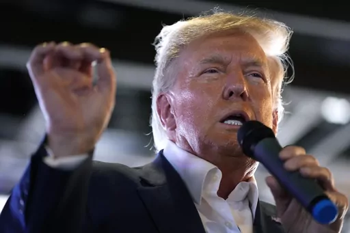 Republican presidential candidate former President Donald Trump speaks to supporters during a visit to the Iowa State Fair, Aug. 12, 2023, in Des Moines, Iowa. After every indictment that has come his way, Trump has boasted that his standing among Republicans only improves — and he has a point. Nearly two-thirds of Republicans — 63% — say they want the former president to run again, according to new polling from The Associated Press-NORC Center for Public Affairs Research.(AP Photo/Charlie