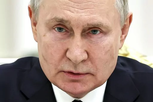 FILE – Russian President Vladimir Putin meets with servicemen at the Kremlin in Moscow, Russia, on Tuesday, June 27, 2023. Putin is poised to sweep to another six-year term in the March 15-17 presidential election, relying on his rigid control of Russia established during his 24 years in power — the longest Kremlin tenure since Soviet leader Josef Stalin. (Mikhail Tereshchenko, Sputnik, Kremlin Pool Photo via AP, File)