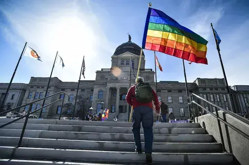Demonstrators gather on the steps of the Montana state Capitol protesting anti-LGBTQ+ legislation in Helena, Mont., March 15, 2021. (Thom Bridge/Independent Record via AP, File)