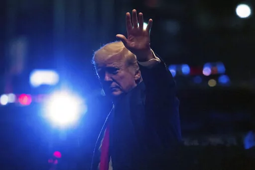Former President Donald Trump arrives at Trump Tower, late Tuesday, Aug. 9, 2022, in New York. (AP Photo/Yuki Iwamura)