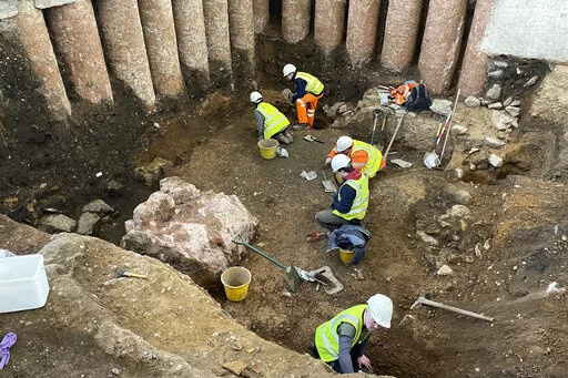 This undated photo and issued on Tuesday March 7, 2023 by the University of Leicester shows an archaeological dig in the grounds of Leicester Cathedral, which began in October 2021. Experts from the University of Leicester said Tuesday that they have uncovered what they believe to be a Roman shrine beneath a former graveyard in the grounds of a cathedral in central England. (University of Leicester Archaeological Services via AP)