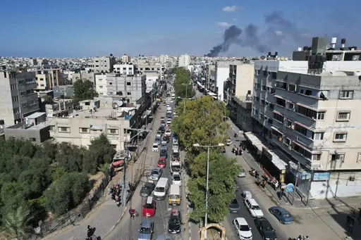 Palestinians flee from northern Gaza to the south after the Israeli army issued an unprecedented evacuation warning to a population of over 1 million people in northern Gaza and Gaza City to seek refuge in the south ahead of a possible Israeli ground invasion, on Oct. 13, 2023. Najla Shawa and her family are safe for now after fleeing their home in Gaza City, but she’s worried she may never be able to return. Shawa, a Gaza native who works for the international aid group Oxfam, is sheltering w