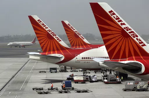 Air India aircrafts stand at Indira Gandhi International Airport in New Delhi, India, April 29, 2011. An Air India plane flying from New Delhi to San Francisco landed in Russia after it developed an engine problem, officials said on Wednesday, June 7, 2023. The plane, carrying 216 passengers and 16 crew members, landed safely at Russia’s Magadan airport in the country’s far east on Tuesday, Air India said in a statement. (AP Photo/Kevin Frayer, File)