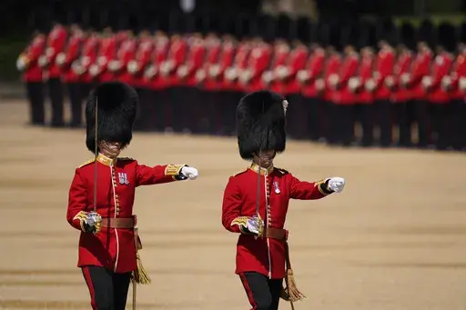 Soldiers attend the Colonel's Review, the final rehearsal of the Trooping the Colour, the King's annual birthday parade, at Horse Guards Parade in London, Saturday, June 10, 2023. (AP Photo/Alberto Pezzali, File)