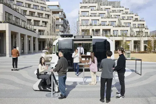 This photo provided by Woven by Toyota shows the square at the center of the apartment complexes of Woven City in Susono city, Shizuoka Prefecture on Feb. 2025. (Woven by Toyota via AP)