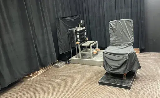 This undated photo provided by the South Carolina Department of Corrections shows the state's death chamber in Columbia, S.C., including the electric chair, right, and a firing squad chair, left. (South Carolina Department of Corrections via AP, File)