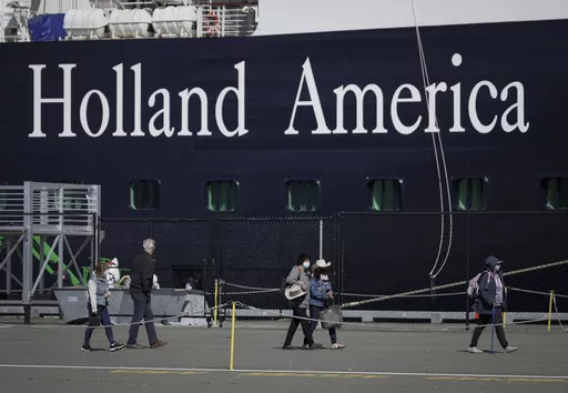 A Holland America cruise ship is shown in Victoria, Canada on Saturday, April 9, 2022. Two crew members on a Holland America cruise ship died during an “incident” in the ship's engineering space, the cruise line said. The unidentified crew members died Friday, March 22, 2024, while the Florida-based Nieuw Amsterdam was at Half Moon Cay in the Bahamas, Holland America said in a statement.(Darryl Dyck/The Canadian Press via AP)