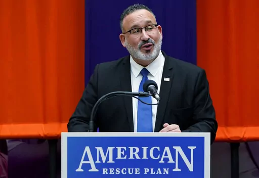 Secretary of Education Miguel Cardona speaks during a visit with first lady Jill Biden to Bergen Community College in Paramus, N.J., Jan. 20, 2022. Cardona on Thursday, Jan. 27, called on the nation’s schools to act more urgently to help millions of students who have fallen behind during the pandemic. "We must make up for lost time,” he said. (AP Photo/Seth Wenig, File)