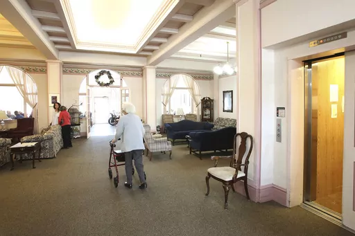 Bret Harte Retirement Inn residents make their way down to the dining room for lunch, May 6, 2020, in Grass Valley, Calif. By the end of the century, the U.S. population will be declining without substantial immigration, senior citizens will outnumber children and the share of white residents who aren't Hispanic will be less than half of the population, according to population projections released Thursday, Nov. 9, 2023 by the U.S. Census Bureau. (Elias Funez/The Union via AP, File)