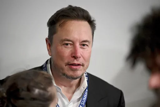 Tesla CEO Elon Musk attends the first plenary session of the AI Safety Summit at Bletchley Park, on Nov. 1, 2023 in Bletchley, England. A Delaware judge this week invalidated Elon Musk's $55.8 billion Tesla pay package, saying it is too big and that Musk set the terms with a complaint board. (Leon Neal/Pool Photo via AP, File)