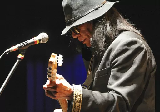Singer-songwriter Sixto Rodriguez performs at the Beacon Theatre on April 7, 2013, in New York. Rodriguez, who became the subject of the Oscar-winning documentary “Searching for Sugarman” has died, according to the Sugarman.org website on Tuesday, Aug. 8, 2023, and confirmed Wednesday by his granddaughter. He was 81. (Photo by Evan Agostini/Invision/AP, File)