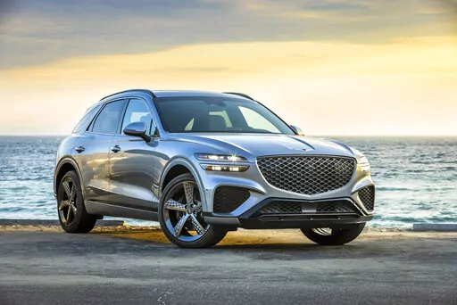 This photo provided by Hyundai shows the 2022 Genesis GV70, the company's first compact luxury SUV. (Courtesy of Hyundai Motor America via AP)