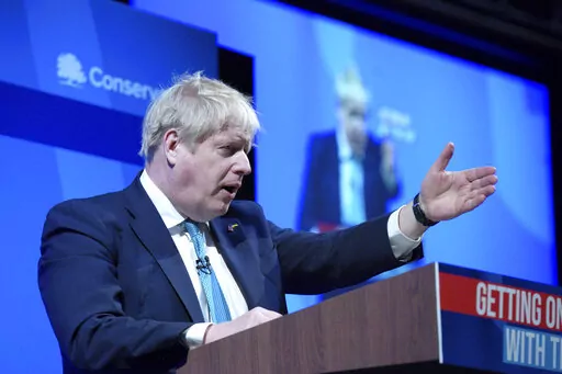 Britain's Prime Minister Boris Johnson speaks at the Conservative Party Spring Forum in Blackpool, England, Saturday March 19, 2022. (Peter Byrne/PA via AP)