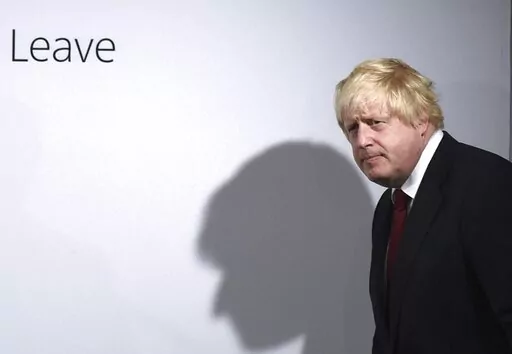 Vote Leave campaigner Boris Johnson arrives for a press conference at Vote Leave headquarters in London Friday, June 24, 2016. British media say Prime Minister Boris Johnson has agreed to resign on Thursday, July 7 2022, ending an unprecedented political crisis over his future. (Mary Turner/Pool via AP, File)