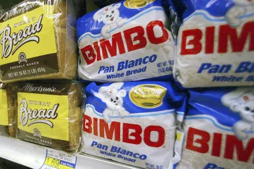 Bimbo bread is displayed on a shelf at a market in Anaheim, Calif., on April 24, 2003. On Tuesday, June 25, 2024, U.S. federal food safety regulators warned Bimbo Bakeries USA - which includes brands such as Sara Lee, Oroweat, Thomas', Entenmann's and Ball Park buns and rolls - to stop using labels that say its products contain potentially dangerous allergens when they don't. (AP Photo/Damian Dovarganes, Files)