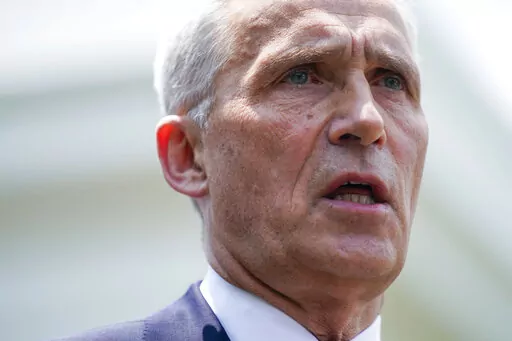 NATO Secretary General Jens Stoltenberg talks to reporters outside the White House after meeting with President Joe Biden, Thursday, June 2, 2022, in Washington. (AP Photo/Evan Vucci)